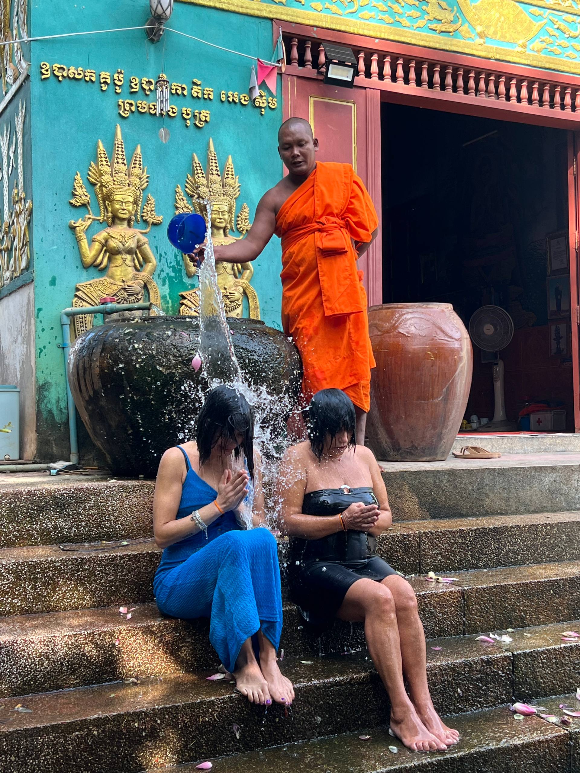 Buddhist Water Blessing and Real Life Experience with Local